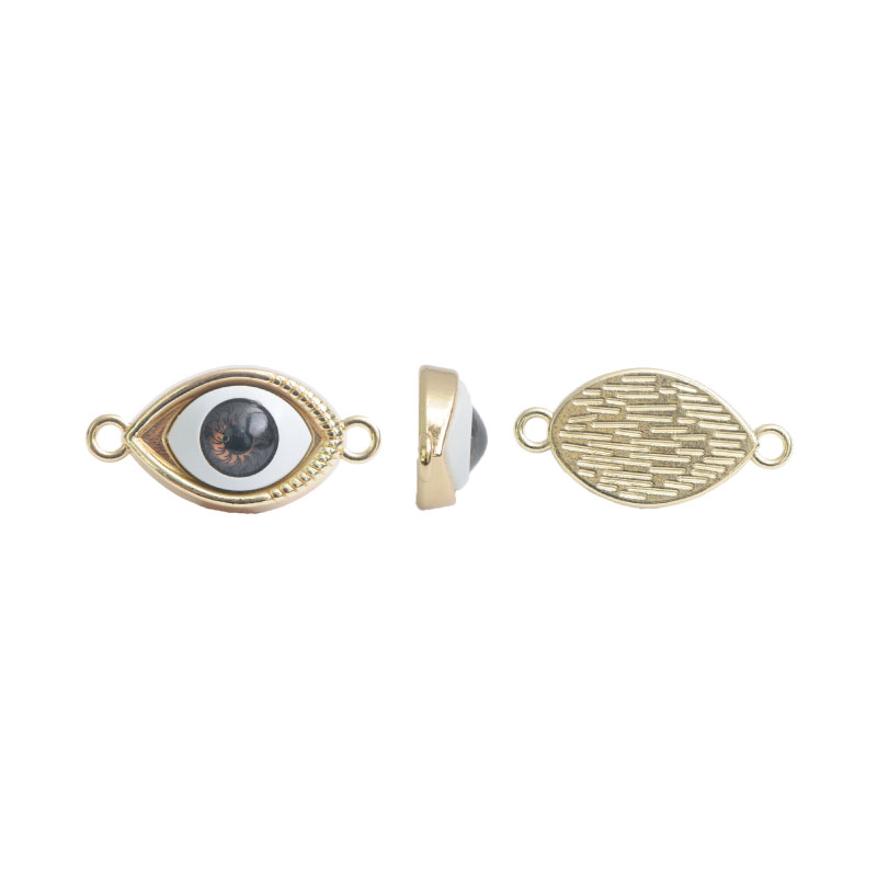 Ojo de fatima 30x15mm cafe x und